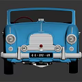 Blue Vintage Convertible Car With Red Interior And Shiny Body Design