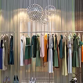 Colorful Dresses in Various Styles Hanging on Racks with High Heels and Decorative Lights
