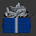 Blue Patterned Gift Box With White Ribbon Bow And Decorative Curls