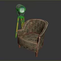 Classic Patterned Fabric Armchair With Wooden Legs Beside Yellow Tripod Floor Lamp