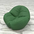 Soft and Comfortable Green Bean Bag Chair on Marble Textured Floor