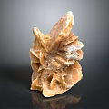 Detailed Natural Stone Sculpture Carving With Intricate Texture And Abstract Design Features