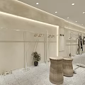 Modern Clothing Store Interior With Clothing Racks Mannequin Plants And Bright Lighting