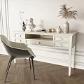 White Desk with Drawers Vases Plants Books and Gray Chair on Wooden Floor White Walls