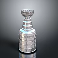 Silver Trophy Sculpture With Detailed Carved Design And Layered Base