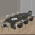 Black Oval Dining Table with Beige Brown Chairs Open Book and Fruit Plate in Light Interior