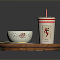 Wooden Tray Holding Drink with Straw and Patterned Teacup on Small Saucer