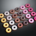 Colorful Assorted Donuts With Different Frostings And Glazes Displayed On Dark Background