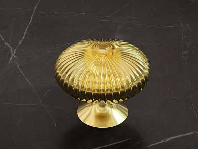Golden Round Textured Cabinet Knob with Ridge Design on Black Marble Surface 3d model