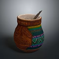 Handcrafted Decorative Cup With Colorful Woven Patterns And Leather Accents And Straw