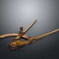 Vintage Ornate Metal Tool Featuring Golden Decoration And Intricate Carved Patterns