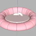 Modern Pink Round Bed Upholstered with Soft Cushions for Cozy Bedroom Interior