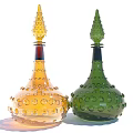 Yellow and Green Ceramic Decorative Bottles with Raised Dot Patterns Conical Lids and Rounded Bases 3d model