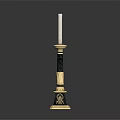 Elegant Gold And Black Hardware Tools With Carved Decoration And White Candle