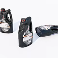 Labeled Black Plastic Bottles With Red Caps For Household Electrical Appliance Care