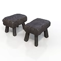 Two Dark Wooden Stools With Textured Surface On White Background 3d model
