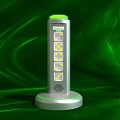 Silver Columnar Device With Green Top And Yellow Indicator Lights On Green Wavy Background