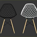 Stylish Modern Black and White Chairs Featuring Mesh Design and Wooden Legs