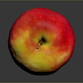 Fresh Ripe Red and Yellow Apple with Shiny Skin on Dark Background