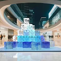 Art Installation Made of Stacked Ice Blocks in Modern Mall with Pedestrians Around