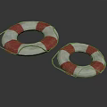 Red And White Striped Lifebuoys With Rope Handles For Marine Safety