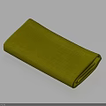 Neatly Folded Green Cloth on Light Blue Background with Soft Shadow