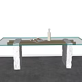 Glass Top Dining Table With Stone Legs Featuring Magazine And Minimalist Interior Decor