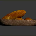 Three Golden Brown Roasted Sweet Potatoes in Wooden Plate on Dark Background