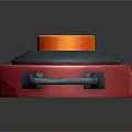 Red Circular Object With Orange Top Button Gray Middle Part And Handle Clasp