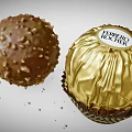 Ferrero Rocher Chocolate Ball With Gold Foil Wrapping And Crunchy Hazelnut Pieces