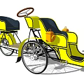Vintage Yellow Tricycle Car With Black Seats Steering Wheel And Orange Details
