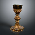 Elegant Golden Decorative Goblet with Intricate Carved Detailing and Ornate Base as Household Decor Item