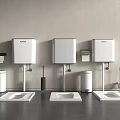 Three White Toilets With Water Tanks Trash Cans And Toilet Brushes In Gray Wall Bathroom