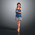 Blue Patterned Halter Neck Dress With Gray Hem Worn By Woman