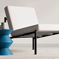 Modern Minimalist Leisure Chair With White Cushion Black Metal Frame And Blue Side Table