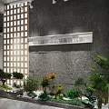 Modern Office Interior Design With Open Layout Glass Partitions Pendant Lights And Decorative Plants