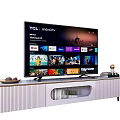 TCL Android TV With Streaming Apps On Modern Living Room TV Stand