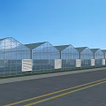 Garden Ornaments Featuring Glass Greenhouse Structures Along Road Under Blue Sky