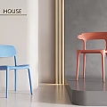 Modern Minimalist Single Chair In Blue Orange Colors With Sleek Plastic Design For Indoor