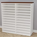 White Multi Layer Bookshelf With Brown Top Against Gray Wall And Wooden Herringbone Floor