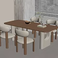 Modern Wooden Dining Table With Four Light Colored Chairs Fruit Bowl And Green Plant