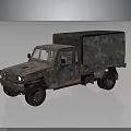 Vintage Rusty Military Truck With Camouflage Paint And Canvas Covered Cargo Bed