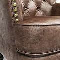 Brown Leather Single Sofa With Diamond Tufted Design And Studded Trim Black Legs
