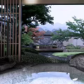 Japanese Style Garden Landscape With Wooden Lattice Gate Pond Stones And Distant Mountains