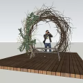 Nest Shaped Outdoor Garden Ornament With Wooden Platform Bench And Green Vines Decoration