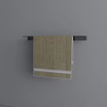 Beige Towel With White Stripe Hanging On Black Rack Against Gray Background
