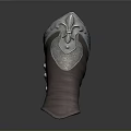 Two Brown Armor Vambraces with Metallic Decorations on Smooth Gray Reflective Surface