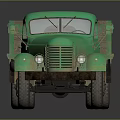 Vintage Green Truck With Open Cargo Bed And Worn Exterior Appearance