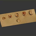 Whole And Opened Nuts Arranged On A Wooden Board With Gray Background