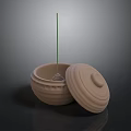 Carved Ceramic Sculpture with Open Lid and Incense Stick Textured Surface Design